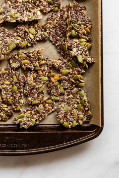 a tray filled with granola bars on top of a table