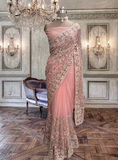 Beautiful peach-pink net saree with colourful thread work and running blouse piece. This saree is very light in weight and it's perfect for a small function. Glitter Falling, Net Blouses, Crepe Saree, Bleu Pastel, Net Saree, Organza Saree, Saree Look, Thread Work, Georgette Sarees