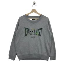 Everlast NYC Sweatshirt Big Logo Spellout Pullover Jumper Boxing Clothing Style Sportswear Size : M Measurement : Pit to Pit : 22" Front Length : 26" Shoulder to shoulder: 21"  Sleeve Length :20"  Shipping Worldwide with with tracking number. Any questions don't hesitate to contact me.  Thank you for your visit B65 Everlast Clothing, Nyc Sweatshirt, Jumper Style, Tracking Number, Mens Sweatshirts, Sweat Shirt, Jumper, Gender Neutral, Adult Outfits