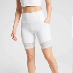 Like New, Never Worn. Bright Flattering White Color With Mesh Detail. Stretchy And Comfortable. Perfect For Wearing Around And Lounging, Or For Exercise. Slight Mark That Has Been There Since I Got Them. Haven’t Washed Them To Try And Get It Out, As They Haven’t Been Worn. White Biker Shorts, Athleta Shorts, Semi Annual Sale, Work Shorts, Yoga Shorts, Sustainable Fabrics, Shorts Athletic, Biker Shorts, Bike Shorts