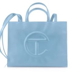 Telfar Medium Brand New With Tags Comes With Dust Bag Authentic Designer Light Blue Shopping Bag, Designer Light Blue Shoulder Bag For Shopping, Light Blue Tote Bag For Evening, Light Blue Evening Tote Bag, Chic Light Blue Bags For Shopping, Chic Light Blue Shopping Bag, Telfar Bags, Mint Bag, Large Shopper Bag