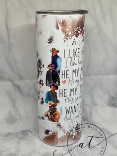 a stainless steel tumbler with the words i like him he's my hero