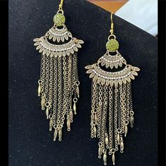 Green Crystals, Beads & Chain Tassels. Dark Gold & Black Tassels On Gold Plated Wires. Approx 4”. A3 Metal Beaded Earrings With Dangling Beads For Party, Metal Beaded Dangling Earrings For Party, Party Metal Beaded Earrings With Dangling Beads, Dangle Jewelry With Gold Beads For Party, Bohemian Jeweled Dangle Beaded Earrings, Bohemian Jeweled Beaded Dangle Earrings, Bohemian Style Jeweled Beaded Dangle Earrings, Gold Jeweled Beaded Dangle Earrings, Green Metal Beaded Earrings For Party