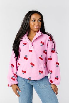 Soft and cuddly sherpa pullover with a cheerful cherry print! Snap close turtleneck Long sleeve with elastic cuffs Hand wash Cheap Pink Winter Shacket, Womans Long Coats Pink, Pink Cow Print Sweater, Pink Clothes Coats & Jackets, Pink Christmas Outfit, Cutest Clothes, Called To Surf, Getaway Dress, Corset Sewing Pattern