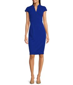 From Calvin Klein&#x2C; this dress features:scuba crepe fabricationsheath silhouettesplit v-necklineShort sleeveslinedcenter back zip closureapprox. 40.5" in lengthpolyester/spandexdry cleanImported. V-neck Elastane Bodycon Dress For Work, Calvin Klein Elegant Short Sleeve Midi Dress, Calvin Klein Summer Sheath Mini Dress, Calvin Klein Blue Sheath Dress, Calvin Klein Summer V-neck Midi Dress, Calvin Klein Fitted V-neck Sleeveless Dress, Calvin Klein Shorts, Midi Sheath Dress, Polyester Spandex