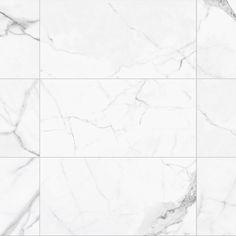 a white marble tile wall with different patterns