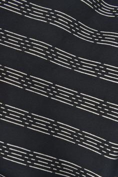 black and white striped fabric with lines on it