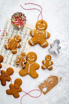 gingerbread cutouts and other decorations on a sheet of paper