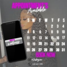 a woman holding an iphone next to a calendar