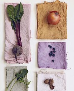 four napkins with vegetables on them are arranged in the shape of rectangles