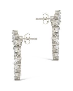 Experience the glamour of the red carpet with Shania Statement Studs! These celebrity-inspired earrings feature dazzling CZ stones sure to make you the star of any occasion. Make a statement and get ready for your close-up! Materials: 14K gold or rhodium plated brass, cubic zirconia Features: 1.1" stud, 3mm-6mm stones, Lead & Nickel free, post back Glamorous Bridal Earrings With Prong Setting For Party, Party Fine Jewelry Cluster Earrings With Cubic Zirconia, Party Fine Jewelry Cluster Earrings In Cubic Zirconia, Glamorous Sterling Silver Earrings With Prong Setting, Cubic Zirconia Chandelier Earrings For Party, Party Cubic Zirconia Diamond Earrings With Prong Setting, Glamorous Single Cubic Zirconia Crystal Earring, Glamorous Cubic Zirconia Earrings With Prong Setting, Luxury Cubic Zirconia Linear Earrings For Party