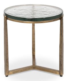 a round glass table with gold frame and metal legs, on an isolated white background