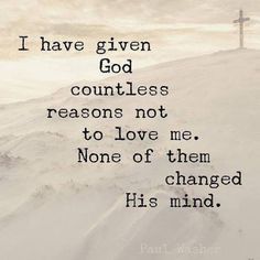 a cross sitting on top of a snow covered hill next to a quote that reads, i have given god countless reason not to love me none of them changed his mind