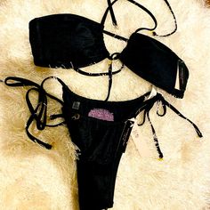 Black Ruched Wireless Style!! Straps Can Be Worn Criss-Crossed Or Tied Together In Front!! Bikini Has A Metallic Sheen To It!! Removable Padding And Convertible Straps!! Brazilian String Bottom Is Also Convertible For More Or Less Coverage In Front & Back!! Gold Logo Charm Details!! Size S!! *Bikini Is All Black (Pink Bikini Photo Is For Convertible Strap Example Only) Chic Black Tie-side Swimwear Bottom, Chic Black Tie-side Bottom Swimwear, Chic Black Tie-side Swimwear, Victoria's Secret Beachwear Swimwear For Party, Victoria's Secret Tie-side Swimwear, Chic Party Swimwear By Victoria's Secret, Chic Victoria's Secret Swimwear For Party, Victoria's Secret Party Beachwear Swimwear, Victoria's Secret Black Swimwear For Beach