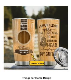 two wooden tumblers sitting next to each other with the words, i can't listen