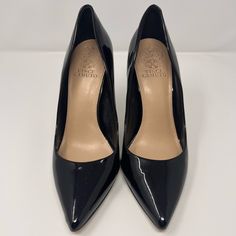 These Are A Gorgeous Pair Of Black Vince Camuto Heels. They Are Used But In Excellent Condition. The Only Signs Of Slight Wear Is At The Bottom Of The Shoes. Otherwise, They Look Brand New. They’re The Perfect Classy Black Heel That Every One Needs In Their Closet! Black Fitted Court Shoes With 4-inch Heel, Black Heels With Branded Heel Counter For Work, Black Patent Leather Heels For Work, Classic Black Heels With 4-inch Heel, Black Fitted Heels With Sculpted Heel, Black Pointed Toe Heels For Formal Occasions, Classic Black 4-inch Heels, Business Black 4-inch Heels, Black Court Shoes With 4-inch Heel For Office