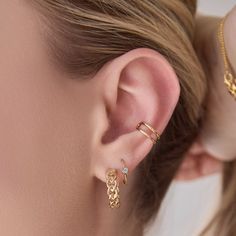 Our ear cuffs make for a perfectly modern layered look. The best part? No piercing required. The Double Ear Cuff is made from solid 14k yellow gold and measures about 7/18" in diameter. In stock cuffs ship within 3 business days. Made-to-order cuffs ship within 1-2 weeks. Details 14k gold 7/18" diameter Sold as single Shipping + Returns In stock earrings will ship within 3 business days. Made-to-order earrings will ship within 1-2 weeks Typically takes 1-2 weeks in production. Unworn Double Ear Gold 14k Ear Cuff For Pierced Ears, Classic 14k Gold Ear Cuff For Pierced Ears, 14k Gold Pierced Ear Cuff Fine Jewelry, 14k Gold Pierced Round Ear Cuff, Gold Pierced Ear Cuff Fine Jewelry, Adjustable Pierced Yellow Gold Ear Cuff, 14k Yellow Gold Internally Threaded Ear Cuff, Pierced Yellow Gold Everyday Ear Cuff, Pierced 14k Yellow Gold Ear Cuff