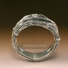 This ring makes a great wedding band - theme of twigs or branches that wrap around your finger. It is handmade in sterling silver and is highly detailed. Almost fully 3-dimensional in the form of the twigs. Only the inside of the ring is smoothed, and this done for comfortable wear. Otherwise it is very realistic. I do a bright polish over a light oxidation. Its a beautiful look, a bit of nature on your hand. Set between the branches are three, 3mm round, white sapphires. They nest tight and sec Branch Wedding Band, Branch Ring, White Sapphire, Wedding Band, Vines, Wedding Bands, Rings For Men, Sapphire, Band