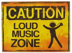 a yellow sign that says caution loud music zone