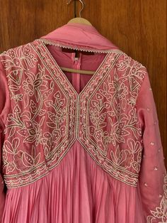 Heavy Hand embroidered Anarkali with banarasi dupatta / pure silk anarkali suit set / anarkali dupatta USA / chanderi dress with embroidered Kurta / Indian dresses/ voggish / pink anarkali gown dress         Looking for a perfect indian dress/anarkali/suit sets that are trendy, unique and easy to carry !! yess, You are at the right place. we carry such versatile pieces of anarkalis and suit sets that really let you stand out in any occassion !!      featuring this beautiful anarkali suit in onion  pink color with heavy pearl hand embroidered at the front body with full sleeves as shown !! A very classy, beautiful look makes you standout !! Ready to ship !! Can be done in any color and pattern !! Details :  - color : peach pink hand embroidered  - Dress : pure chanderi silk , chinnon silk a Pink Dola Silk Dress With Dabka Work, Anarkali Gown With Chikankari Embroidery For Diwali, Traditional Pink Dola Silk Dress, Festive Pink Dola Silk Dress, Elegant Maxi Length Pink Dupatta, Elegant Pink Maxi Length Dupatta, Pink Anarkali Traditional Wear With Dori Work, Pink Maxi Length Dupatta For Diwali, Pink Maxi-length Dupatta For Diwali