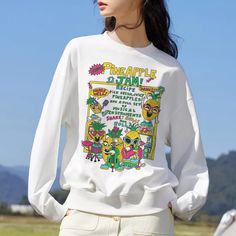 Inspired by the cute Y2K aesthetic, this pineapple jam sweater, sweatshirt, pullover or however you may call it is perfect to keep you warm in style. The harujuku inspired design of this retro trendy unisex sweatshirt surely make anyone smile that maybe they're making pineapple jam the wrong way. This pineapple jam sweatshirt was inspired by vintage comics with its popping colors and bold color combinations.. think of that bubble gum, with comics as a wrapper - do you remember? This kawaii sweat Kawaii Fall Streetwear Tops, Fall Kawaii Tops For Streetwear, Kawaii Tops For Fall Streetwear, Fall Kawaii Streetwear Tops, Fall Kawaii Graphic Print Sweatshirt, Fall Kawaii Sweatshirt With Graphic Print, Kawaii Graphic Print Tops For Fall, Kawaii Tops With Graphic Print For Fall, Kawaii Relaxed Fit Tops For Streetwear