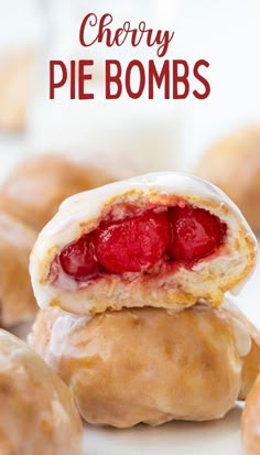 Close-up image of two cherry pie bombs stacked on top of each other. One pie bomb has been cut open to showcase the bright red cherry pie filling inside. Cherry Pie Filling Uses, Uses For Cherry Pie Filling, Pie Holes Recipes, Pillsbury Pie Poppers, Cherry Bites, Cherry Pie Desserts, Pie Cherry Recipes, Cherry Pie Filling Desserts Easy, Desserts With Pie Filling