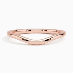 Petite Curved Wedding Ring - 14K Rose Gold. This curved wedding band is perfectly shaped to complement many engagement ring styles for a simple and sophisticated look. Classic Rose Gold Half Eternity Stackable Rings, Formal Rose Gold Stackable Rings With Simple Design, Rose Gold Stackable Rings For Formal Occasions, Classic Rose Gold Stackable Open Band Rings, Classic Rose Gold Stackable Rings With Open Band, Modern Rose Gold Stackable Rings For Formal Occasions, Minimalist Rose Gold Stackable Rings For Formal Events, Minimalist Rose Gold Stackable Rings For Formal Occasions, Minimalist Rose Gold Stackable Rings For Formal