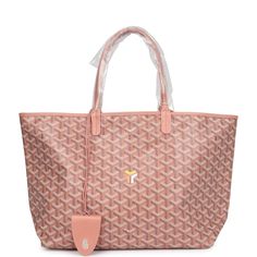 This 2024 Limited Edition Goyard Saint Louis PM tote is in iridescent pearly coral Goyardine coated canvas and Iridescent coral chevroches calfskin leather trim with palladium hardware, contrast stitching, and has a matching detachable button closure wallet and a removable magnetic fastening snap.The interior is lined with beige canvas.Origin: FranceCondition: New and never worn (plastic on handles)Accompanied by: Dustbag, felt, detachable wallet, removable magnetic fastening snap, magnectic sna Luxury Pink Coated Canvas Bag, Designer Pink Coated Canvas Bag, Pink Designer Coated Canvas Shoulder Bag, Designer Pink Coated Canvas Shoulder Bag, Luxury Pink Coated Canvas Shoulder Bag, Pink Coated Canvas Top Handle Shoulder Bag, Pink Coated Canvas Shoulder Bag With Top Handle, Luxury Pink Shoulder Bag With Leather Handles, Pink Goyard