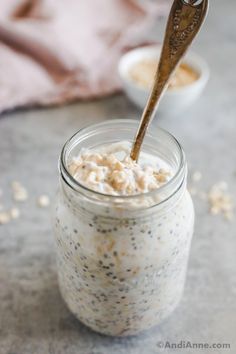 a spoon in a jar filled with oatmeal