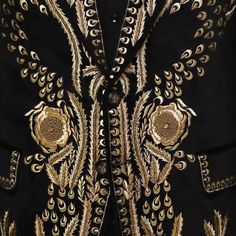 The Bespoke Black Blazer with Golden Hand-Embroidery is a masterpiece of elegance and opulence. Immerse yourself in the world of bespoke tailoring with this meticulously crafted garment.

 	Fabric: Velvet
 	Lining Fabric: Silk
 	Buttons: Brass
 	Pattern: Golden Hand Embroidery
 	Construction: Half Canvas
 	Jacket: Embroidery Shawl Lapel, Flap Pockets, Single Breasted Closure. Luxury Blazer, Embroidery Shawl, Jacket Embroidery, Blazer For Men, Garment Fabric, Canvas Jacket, Bespoke Tailoring, Black Luxury, Fabric Silk