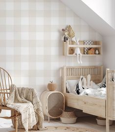 a white and beige bedroom with checkered wallpaper