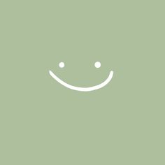 a smiling face on a green background