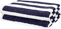 three blue and white towels stacked on top of each other