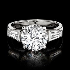 Ross-Simons - 3.60 ct. t. w. Lab Grown Diamond Ring Round Cut in 14kt White Gold. Size 5. Extraordinary in size and sparkle, our radiant three-stone ring delivers high-end glamour at an incredible value. A 3.00 carat round brilliant-cut lab-grown diamond is flanked by .60 ct. t. w. tapered baguette lab-grown diamonds and set in polished 14kt white gold. Lab-grown diamonds are identical to mined diamonds according to their optical, physical and chemical properties. All Ross-Simons lab-grown diamo Platinum Three-stone Baguette Cut Diamond Ring, Platinum Three Stone Diamond Ring With Baguette Cut, Three Stone Baguette Cut Platinum Diamond Ring, Diamond Ring Round, Physical And Chemical Properties, Pure Design, Diamond Birthstone, Three Stone Rings, 14kt Gold