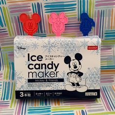 some kind of ice candy maker with mickey mouse on it