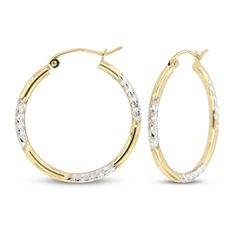 These stunning hoop earrings for her are crafted in iconic 14K yellow gold and showcase a beautiful diamond cut finish set in rhodium flashes. The 20mm hoops secure with snap-lock clasps. 14k Gold Diamond Cut Hoop Earrings For Anniversary, 14k White Gold Hoop Jewelry, Anniversary Yellow Gold Hinged Hoop Earrings, 14k Gold Small Hoop Hinged Jewelry, Small Hoop Hinged 14k Gold Jewelry, Small Hoop Earrings In Yellow Gold With Diamond Cut, Fine Jewelry Small Hoop Earrings With Diamond Cut, Small Diamond Cut Yellow Gold Hoop Earrings, Small Hoop Diamond Cut Earrings