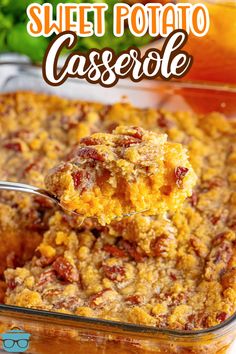 sweet potato casserole in a glass baking dish with a spoon full of the casserole