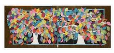 an art project with paper cut outs and leaves on the sides, depicting trees in different colors