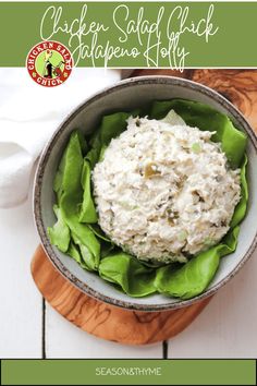 a bowl filled with lettuce and chicken salad