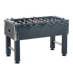 an image of a foosball table with yellow balls on it's legs