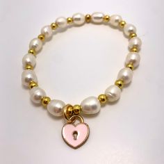 Can you think of a sweeter Mother's Day or Mom's birthday gift? A beading kit for two, this fun and simple kit includes freshwater pearls, gold plated beads and charms, enough to make one 6.5 inch and one 5.5 inch bracelet. Elastic cord, crimp covers, instructions and 2 organza pouches also included. Cheap Pearl Bracelet With Heart Beads For Gift, Cheap Pearl Bracelet With Heart Beads As Gift, Heart Pearl Bracelet, Mala Making, Mother's Day Jewelry, Red Creek Jasper, Bracelet Kit, Earring Kit, Mom's Birthday