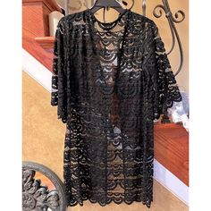 Blue Island Lace Front Tie Dress/Coverup/Jacket Nwt Excellent Condition Size Medium Color: Black Lace Pattern Scalloped Bottom And Sleeves 3/4 Sleeves Tassel Tie Detail Dress Coverup Jacket 100% Nylon Beautiful Black Lace Front Tie Dress, Coverup Or Jacket. Great For Vacation, Resort Wear, Pool, Ocean, Beach. Layer Over A Dress, Skirt, Jeans Or Leggings. Very Versatile. Packable, Wrinkle Free, Lightweight, Gift, Honeymoon, Shower Blue Island Lace Front Tie Dress/Coverup/Jacket 5 Star Posher Fast Chic Lace Outerwear For Party, Black Summer Evening Outerwear, V-neck Outerwear For Spring Night Out, V-neck Outerwear For Night Out In Spring, Elegant Long Sleeve Outerwear For Vacation, Black Lace Party Outerwear, Elegant Beach Outerwear With Open Front, Elegant Open Front Beach Outerwear, Elegant Spring Beach Outerwear