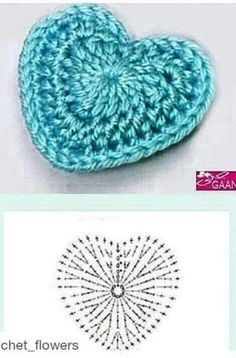 the crochet heart is made with two different colors and sizes, including one blue