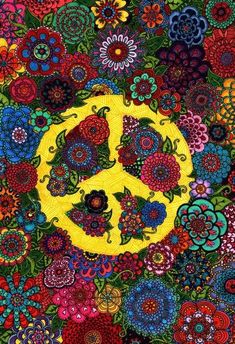 the peace sign is surrounded by many colorful flowers and leaves, all in different colors