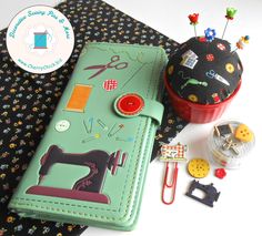 a sewing kit with scissors, pincuss and buttons