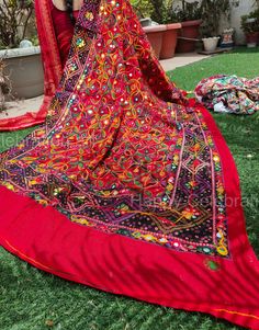 Product Item: Full Embroidery Work Dupatta  Size- Length> 86 Inch (2.25' Meter) Width >38 Inch Approx. Please share color choice after buying Fabric> Cotton Uses: (1)Traditional Wear: These dupattas can be paired with traditional Indian outfits like salwar kameez, anarkali suits, lehengas, and sarees. They add a touch of elegance and ethnicity to your attire. (2)Casual Wear: You can also wear these Phulkari dupattas with your everyday casual outfits like jeans and kurtis to give them a pop of color and style. (3)Festivals: These dupattas are perfect for festive occasions like Diwali, Holi, Eid, or other cultural celebrations. The intricate embroidery and mirror work can make you stand out during festivities. (4)Weddings and Special Occasions: They are great choices for attending weddings, Red Semi-stitched Bohemian Lehenga, Red Bohemian Lehenga With Resham Embroidery, Bohemian Red Blouse Piece With Pallu, Bohemian Blouse Piece For Wedding And Festivals, Bohemian Red Lehenga With Traditional Drape, Red Bohemian Lehenga With Traditional Drape, Red Bohemian Blouse Piece For Diwali, Bohemian Red Blouse Piece For Diwali, Red Bohemian Blouse For Navratri