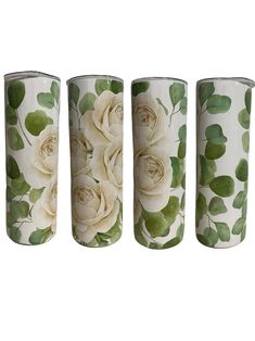 three vases with white roses and green leaves painted on the sides, each one in different colors