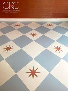 the floor is painted with red and white stars on it, as well as an orc logo