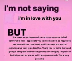 a pink poster with the words i'm not saying i'm in love with you