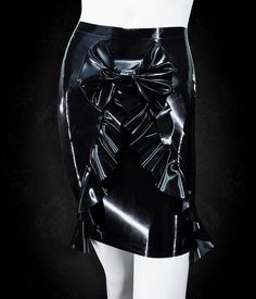 High quality latex Underwire & heavy rubber cups Adjustable straps Beaded chain on top Ruffled trim on top Back zipper for top and skirt Front bow on top and skirt Frills on skirt Each garment is made to order, please refer to the sizing page to gather this information, and add your measurements to the "special instructions for seller" box when checking out. Please make sure all measurements are accurate Please allow production time for your garment(s) All sales are final Gothic Fitted Mini Skirt With Ruffles, Lip Service Vinyl Skirt, Voluminous Nylon Gathered Skirt, Black Gothic Mini Skirt With Ruffles, Latex Top, Latex Skirt, Skirt Top, Beaded Chain, No Frills